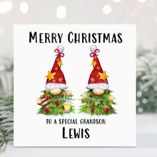 Christmas card with two gnomes and personalized text on a snowy background