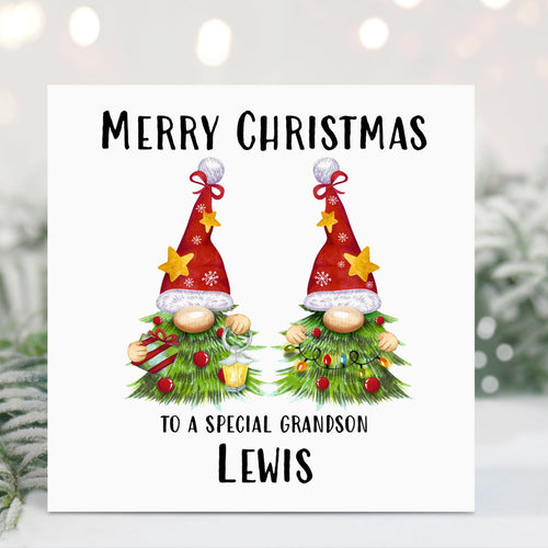 Christmas card with two gnomes and personalized text on a snowy background