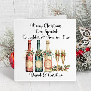 Christmas card with wine bottles and champagne flutes on a white background with decorative elements.