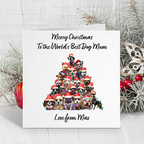Christmas card with a dog-themed tree design and festive text on a white background.