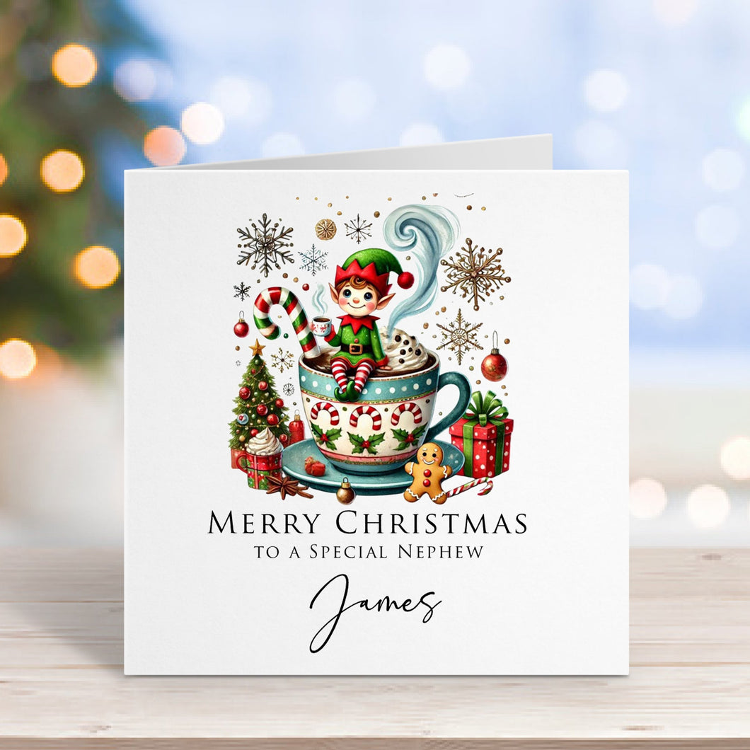 Christmas card with elf design on a wooden surface with blurred lights in the background