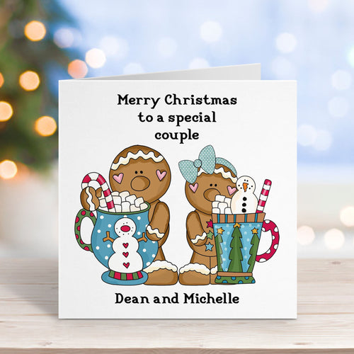 Christmas card with gingerbread people and personalized text on a blurred festive background