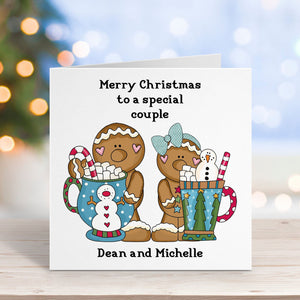 Christmas card with gingerbread people and personalized text on a blurred festive background