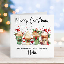 Christmas card with cupcakes and personalized text on a blurred festive background
