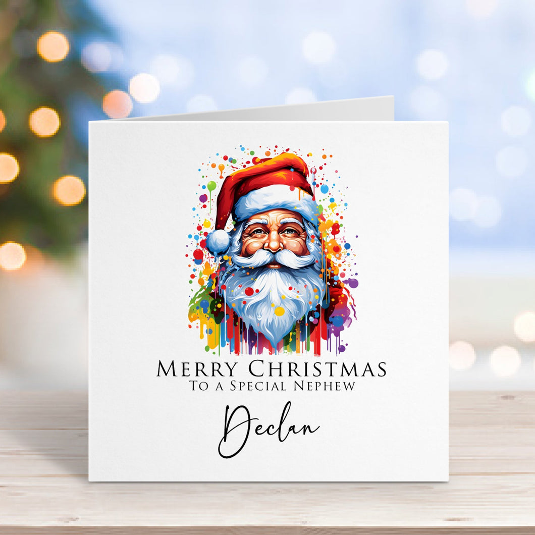 Christmas card with watercolor Santa Claus design on a wooden surface with blurred lights in the background