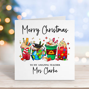 Christmas card with cartoon teachers and personalized text on a blurred festive background