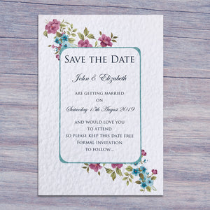 CATHERINE Save the Date cards in white on a blue table