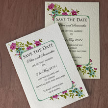 CATHERINE Save the Date cards in white and Ivory on a brown wooden table